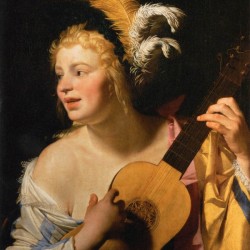 Woman playing the guitar